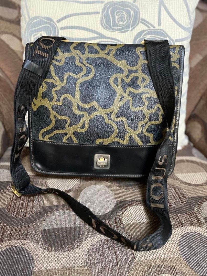 Tous sling bag shop
