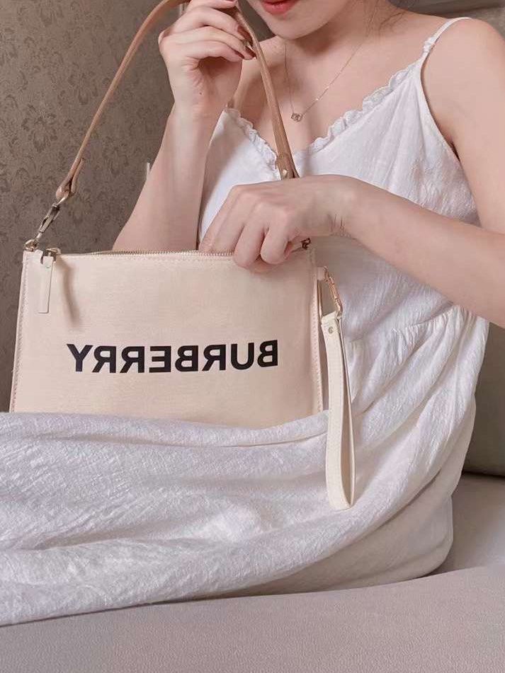 Burberry store wristlet pouch