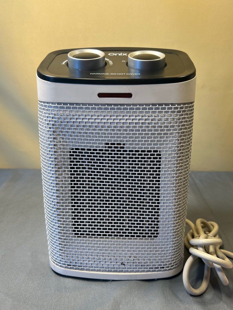 Ceramic Fan Heater (Category: Air Conditioning and Heating) located in Quezon City. Submitted by lucas_luxuries (Listing ID 1224501156, Image 2). Description: 220V 1500W Good 100% Working No Box Imported from Australia .