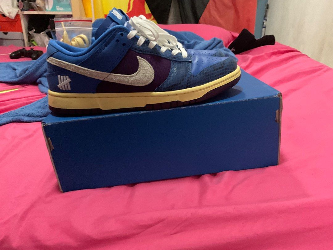 dunk low x undefeated resell price