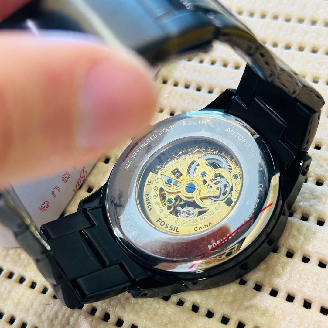 Fossil queensbay 2025 mall
