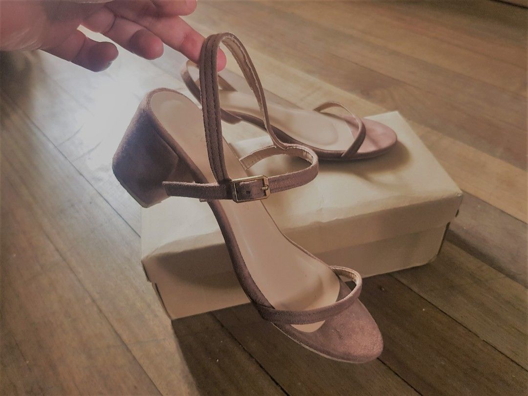 Heeled Sandals (Olivia MNL) (Category: Heels) located in Manila. Submitted by wallanderp (Listing ID 1224374932, Image 2). Description: Heeled sandals worn only once, bought from Olivia MNL. Material is kind of like suede RFS: Decluttering Shipping fee to be shouldered by buyer 🤓 Can also do meet-ups in Makati or Pasig area Details Condition: Used - Good Material: Suede Band Color: Tan Brand: Olivia MNL Size: US 8.