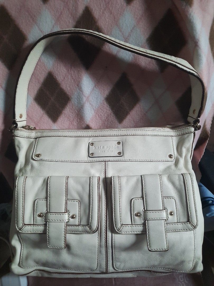 Kate Spade hobo (Category: Luxury Bags & Wallets) located in Paranaque City. Submitted by bluedolphin1911 (Listing ID 1224404881, Image 1). Description: Preloved bag from Korea signs of normal usage with etiketa some stain inside the bag gold hardware 11x14 inches.