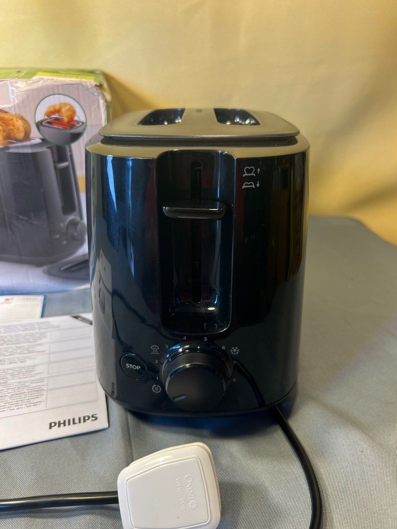 Phillips 2 Slice Toaster (Category: Ovens & Toasters) located in Quezon City. Submitted by lucas_luxuries (Listing ID 1224503881, Image 3). Description: General specifications: Number of browning levels 8 Technical specifications Voltage: 220-240 V Power: 760-900 W Frequency: 50-60 Hz Product features: Adjustable browning Automatic shut-off Cancel button Cool wall exterior Defrost function High lift function Integrated cord storage.