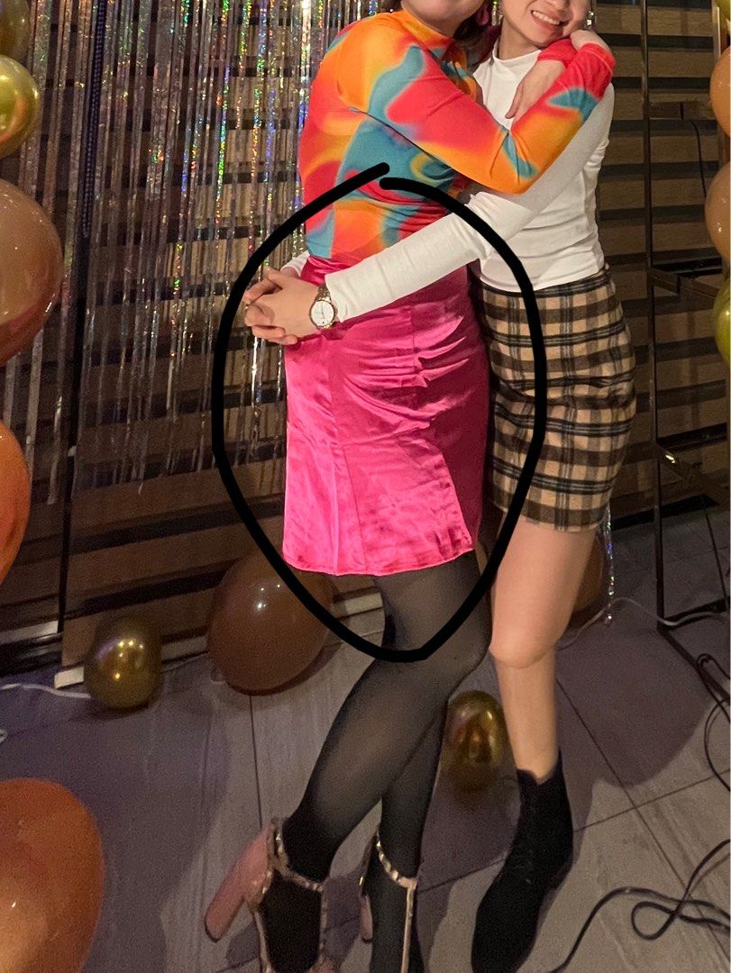 SHEIN pink satin skirt (Category: Skirts) located in Quezon City. Submitted by cha.closet (Listing ID 1224434437, Image 2). Description: Worn once in a retro themed christmas party event, bought in SHEIN APP Fits small to medium.