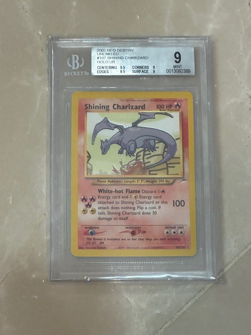 2002 shining charizard pokmon card Pokemon Neo Destiny Shiny #107 PSA 6 2002 Neo Density Shining Charizard,