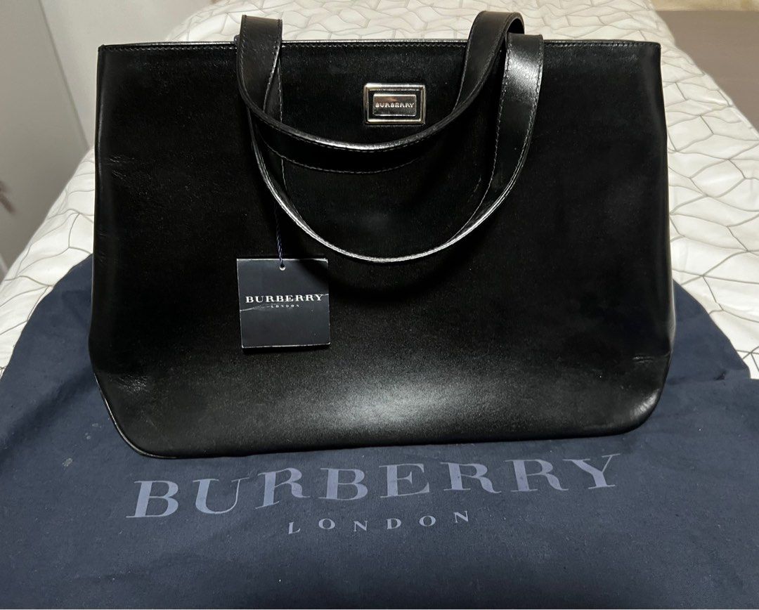 OPEN FOR LAYAWAY Burberry Bag (Category: Luxury Bags & Wallets) located in Cebu City. Submitted by kaye_declutters (Listing ID 1229400298, Image 1). Description: LAYAWAY ACCEPTED IN YOUR OWN TERMS ‼️STEAL‼️💯 Never been used Burberry Tote/ Top handle bag in GHW Shiny Leather with tag. Stored and well kept in my bag display cabinet. With dustbag only. Pls see pics for details. Selling as is. Accepts Layaway Check more available designer bags in my