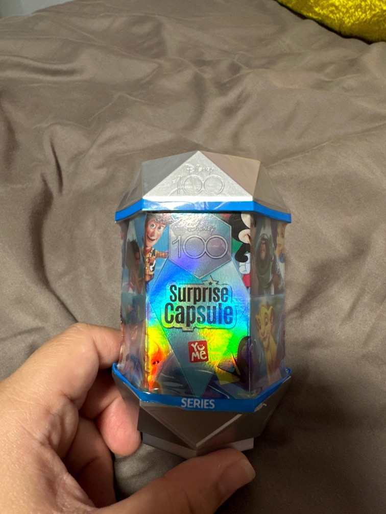 Let's open another Disney 100 Surprise Capsule. Which Disney