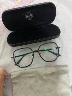 Kacamata minus optik melawai