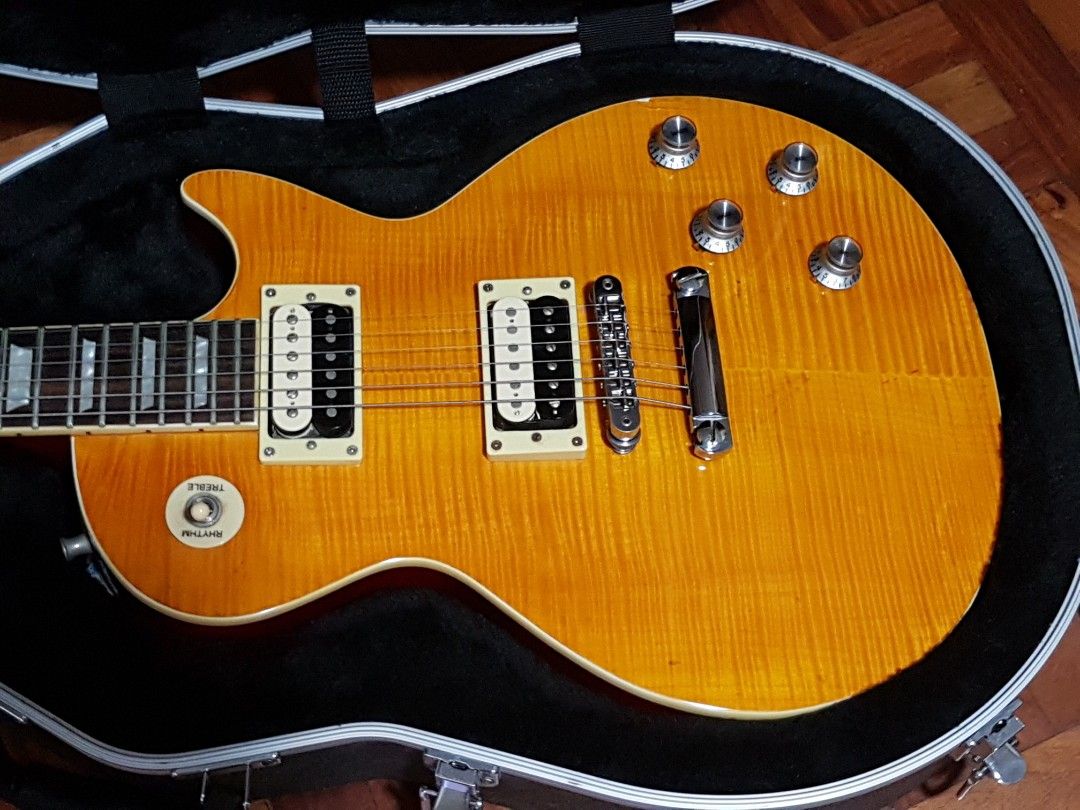 Les Paul AFD (SLASH) Guitar (Category: Musical Instruments) located in Manila. Submitted by Fluffy_music (Listing ID 1229324845, Image 2). Description: <Gibson SLASH AFD les paul> 1. Seymour duncan alnico II Pro SLASH signature hambucker 2. CTS pots (Year 1981) 3. Sprague Ceramic Disc Cap 0.022 uF * 2pcs. (Year 1981) 4. Gavitte wire 5. Genuine Glover 3x3 tuner 6. Genuine Gibson Tune O matic bridge & saddle 7. Gator hardshell case Price negotiable