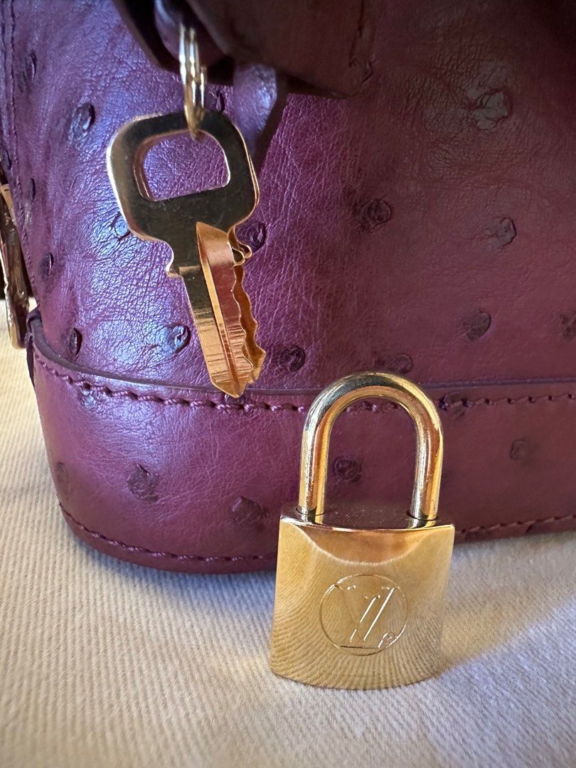 Louis Vuitton Prune Ostrich Alma PM Bag with Gold Hardware