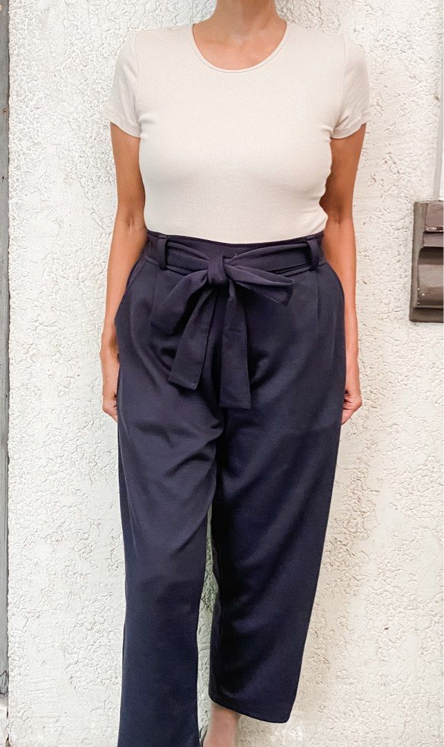 Office Trousers (Category: Other Bottoms) located in Quezon City. Submitted by mommake (Listing ID 1229412429, Image 2). Description: - Timeless work closet staple - Available in pink and dark blue, P240 each - Hips (laid flat): 14 inches, comfortably stretchable until 16 inches, 31 inches in length - Shipping c/of buyer, item can be shipped from QC, Ortigas, or Makati, can also ship via Flash/Gogo Express, no Shopee checkout Model’s dimensions: 