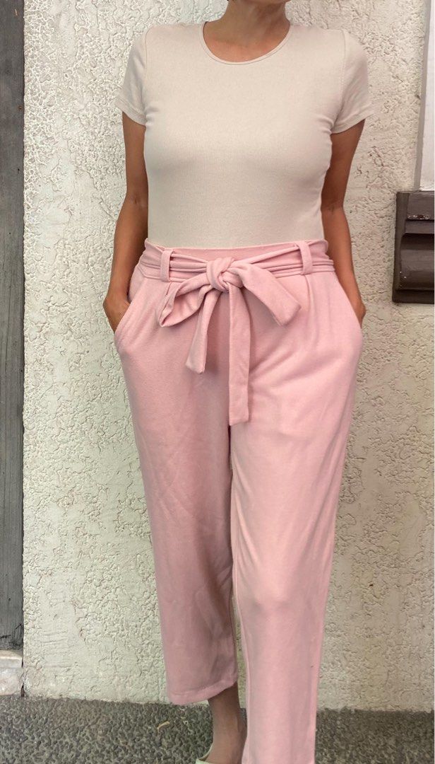 Office Trousers (Category: Other Bottoms) located in Quezon City. Submitted by mommake (Listing ID 1229412429, Image 3). Description: - Timeless work closet staple - Available in pink and dark blue, P240 each - Hips (laid flat): 14 inches, comfortably stretchable until 16 inches, 31 inches in length - Shipping c/of buyer, item can be shipped from QC, Ortigas, or Makati, can also ship via Flash/Gogo Express, no Shopee checkout Model’s dimensions: 