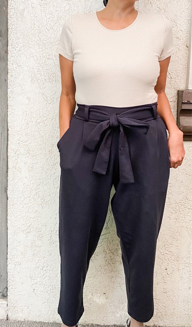 Office Trousers (Category: Other Bottoms) located in Quezon City. Submitted by mommake (Listing ID 1229412429, Image 1). Description: - Timeless work closet staple - Available in pink and dark blue, P240 each - Hips (laid flat): 14 inches, comfortably stretchable until 16 inches, 31 inches in length - Shipping c/of buyer, item can be shipped from QC, Ortigas, or Makati, can also ship via Flash/Gogo Express, no Shopee checkout Model’s dimensions: 