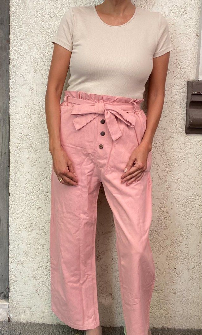 Pink Office Trousers (Category: Other Bottoms) located in Quezon City. Submitted by mommake (Listing ID 1229414625, Image 2). Description: - flattering! - Waist (laid flat): 12.5 inches, comfortably stretchable until 15 inches, 35 inches in length - Shipping c/of buyer, item can be shipped from QC, Ortigas, or Makati, can also ship via Flash/Gogo Express, no Shopee checkout Model’s dimensions: Bust: 34 inches (34B) Waist: 28 inches Hips: 35 inche