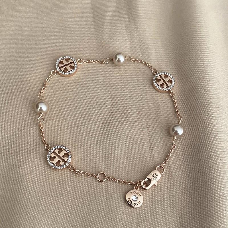Tory burch crystal deals pearl logo bracelet