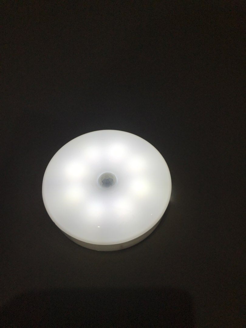 Sensor light (Category: Lighting) located in Singapore. Submitted by lacus123 (Listing ID 1229385439, Image 3). Description: Charge 2 hrs for 90 days USB charging port Colour : White Weight: 100g Size: 8.6cm (L) x 8.6cm (W) x 1.8cm (H) .