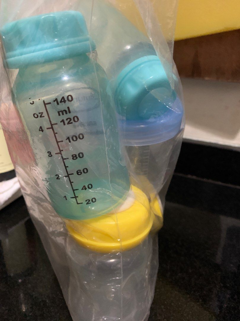 Baby carrier breastmilk bottle, Babies & Kids, Going Out, Carriers