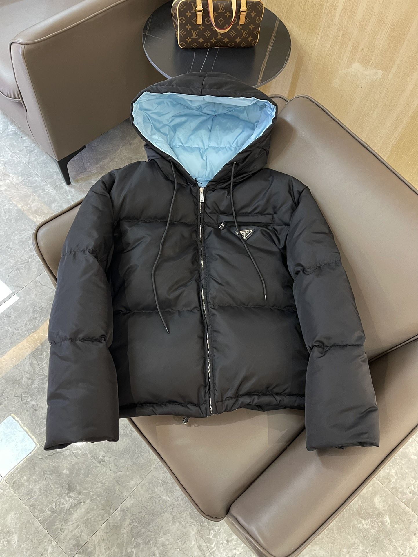 Winter jacket best sale with triangle logo