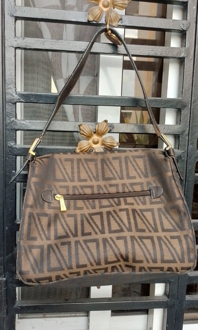 Diana valentino bag price hot sale