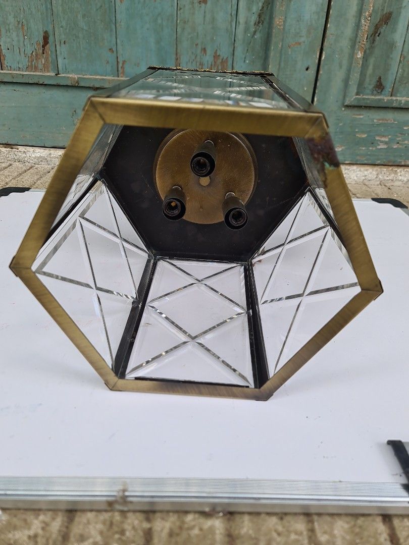 Hanging lamp/Drop light (Category: Lighting) located in Makati City. Submitted by harvesting_game (Listing ID 1224666208, Image 3). Description: Antique brass finish - Hanging lamp/Drop light. Complete accessories. All glass panes intact. 1 piece only Never installed but has a slight discoloration at the bottom due to storage issues - this may be painted over.. Great for the entrance way!.