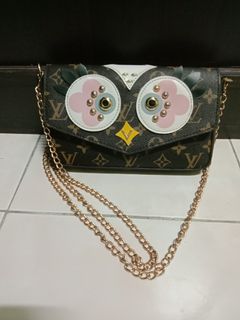 Lv owl sling bag top