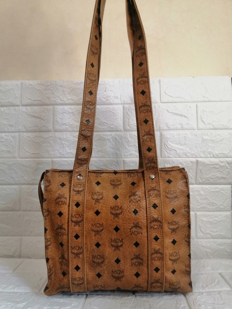Mcm Cognac Shoppers Vintage Bag (Category: Luxury Bags & Wallets) located in Las Pinas. Submitted by etoksi1234 (Listing ID 1224547843, Image 2). Description: Pre-loved Mcm Cognac Shoppers Vintage Bag. Inside lining needs cleaning. Minimal signs of usage please zoom in photos for reference. With RiRi Swiss M6, Made in Germany. Please manage your expectations. All sales are final. Kindly examine pictures carefully when buying online. No return, ex
