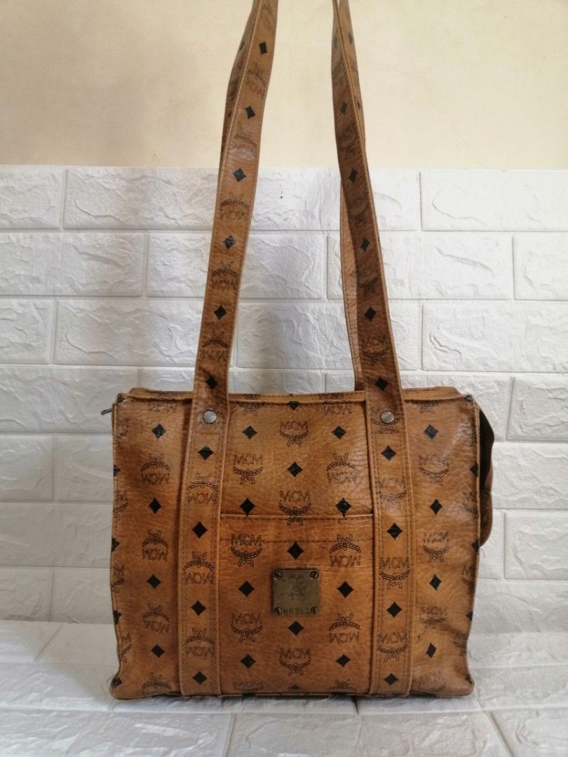 Mcm Cognac Shoppers Vintage Bag (Category: Luxury Bags & Wallets) located in Las Pinas. Submitted by etoksi1234 (Listing ID 1224547843, Image 1). Description: Pre-loved Mcm Cognac Shoppers Vintage Bag. Inside lining needs cleaning. Minimal signs of usage please zoom in photos for reference. With RiRi Swiss M6, Made in Germany. Please manage your expectations. All sales are final. Kindly examine pictures carefully when buying online. No return, ex