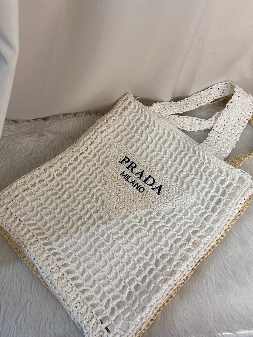 Prada raffia white bag on hand japan (Category: Luxury Bags & Wallets) located in Angeles City. Submitted by lux.finds (Listing ID 1224719530, Image 1). Description: Diclaimer: we are not affiliated with the brand stated in this post, no infringement intended. All copyrights are reserved to its brandowners ..