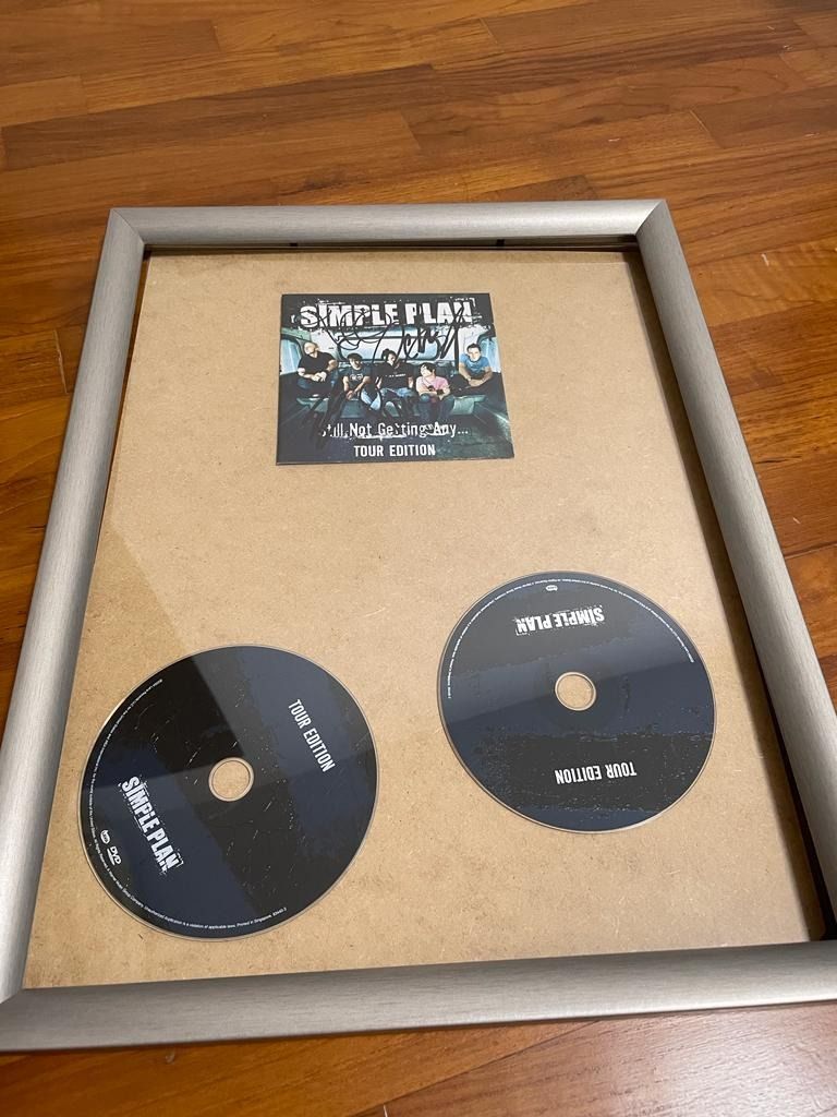 Simple Plan Autographed CD (Category: CDs & DVDs) located in Singapore. Submitted by it-help (Listing ID 1224674874, Image 1). Description: Autographed in prestne condition and framed . Makes for a great wall piece . will also include a thumb drive containing the digital versions of the songs ..