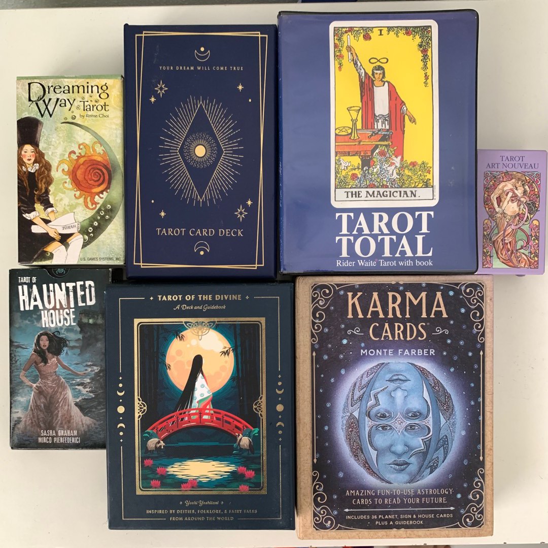 Collection of various Spirit Empress tarot decks on a tabletop