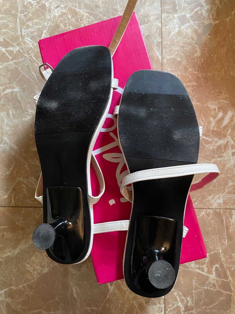White heels (Category: Heels) located in Trece Martires City. Submitted by arrchie (Listing ID 1224624634, Image 3). Description: Actual photos; 2 inches; comfy for long walks; 24.5 cm, standard size 9.