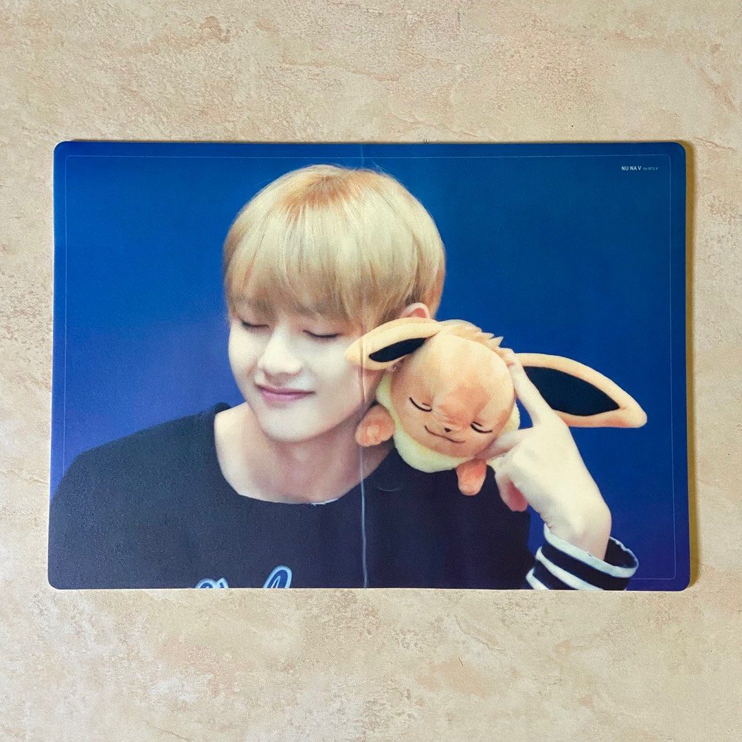 bts taehyung eevee mouse pad (Category: K-Wave Merchandise) located in Subic. Submitted by jyulei (Listing ID 1224764969, Image 1). Description: taehyung eevee mouse pad by nuna v - 28 x 43 cm - has a noticeable fold in the centre - and a rip but not as noticeable - has black easel marks on the back.