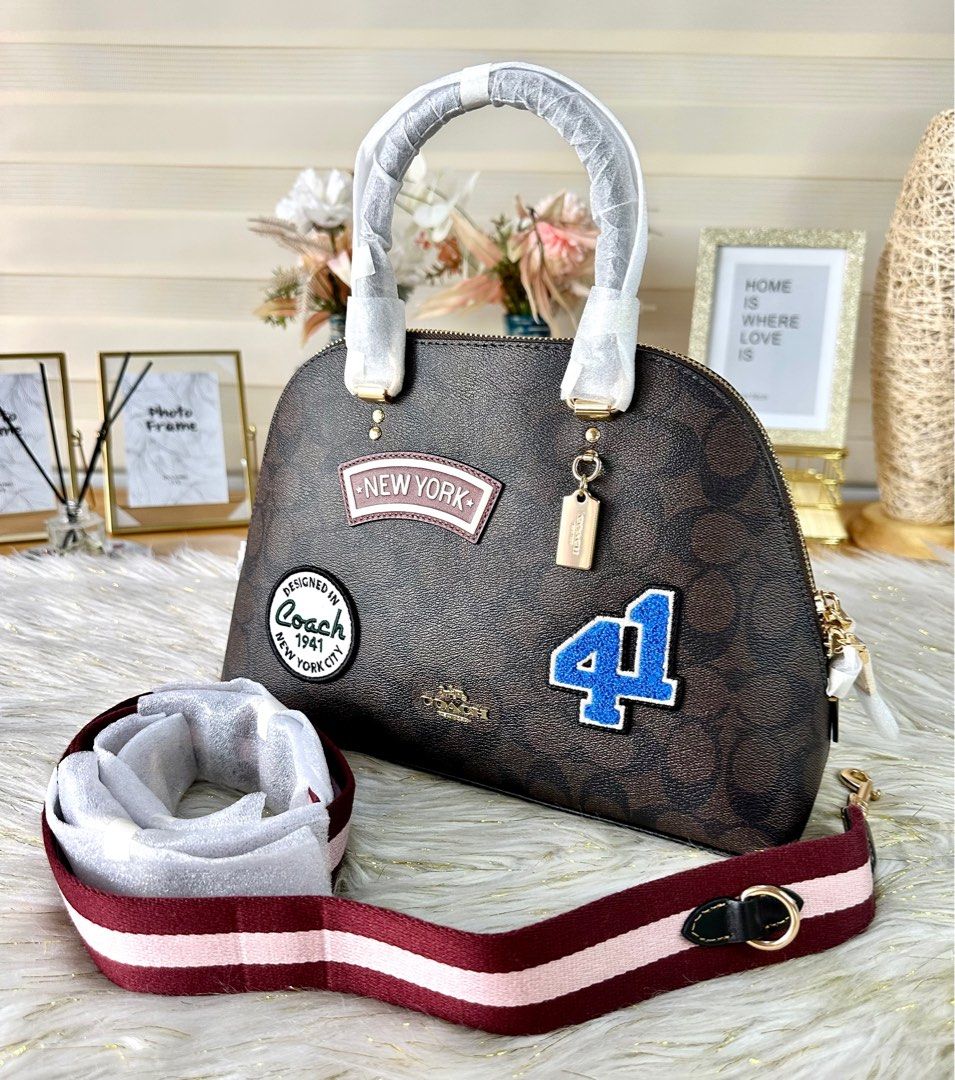 Coach Katy Signature Ski Satchel (Category: Luxury Bags & Wallets) located in Mandaluyong City. Submitted by shop_0n_the_spot (Listing ID 1224792290, Image 2). Description: 💯% GUARANTEED ORIGINAL & BRAND NEW. 🚛 OnH@nd and Ready to Ship 🏷 Inclusions: Tag, Care card 💰 Additional Shipping Fee 🌍 Mandaluyong/ Makati Direct message 📩 us for faster transactions. If in DOUBT don’t buy, to save our both time. We are not PLAYING here, we do our BUSIN