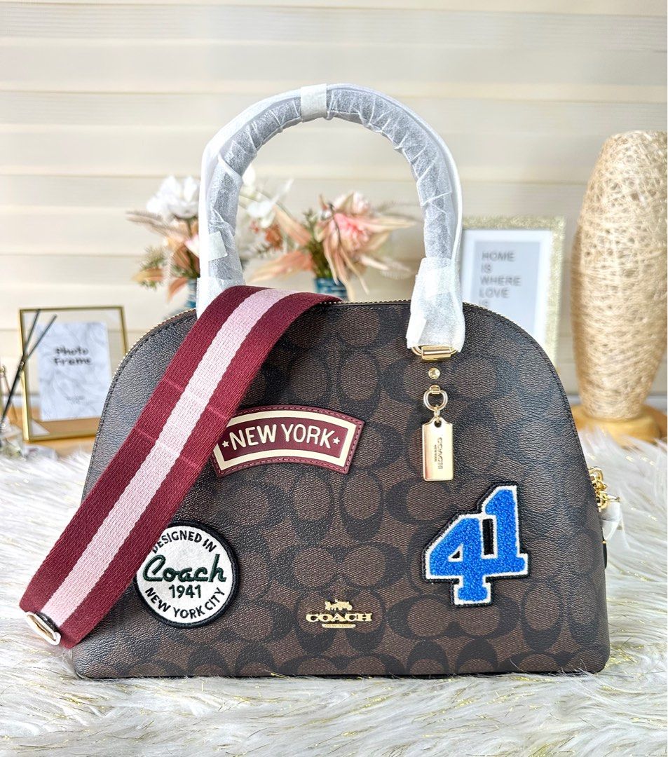 Coach Katy Signature Ski Satchel (Category: Luxury Bags & Wallets) located in Mandaluyong City. Submitted by shop_0n_the_spot (Listing ID 1224792290, Image 1). Description: 💯% GUARANTEED ORIGINAL & BRAND NEW. 🚛 OnH@nd and Ready to Ship 🏷 Inclusions: Tag, Care card 💰 Additional Shipping Fee 🌍 Mandaluyong/ Makati Direct message 📩 us for faster transactions. If in DOUBT don’t buy, to save our both time. We are not PLAYING here, we do our BUSIN
