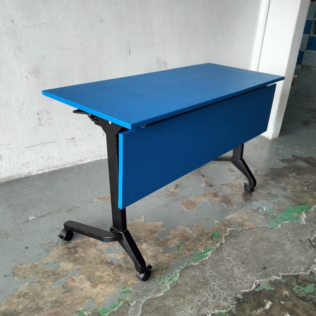 Foldable Study Table (Category: Tables & Sets) located in Singapore. Submitted by kaichispacemaster (Listing ID 1224796422, Image 1). Description: Selling an old sample table. This table folds up to save space. Being sold in "As-Is" condition. Please note that on its surface, you will notice some scratches. Overall, the table is in fair condition..