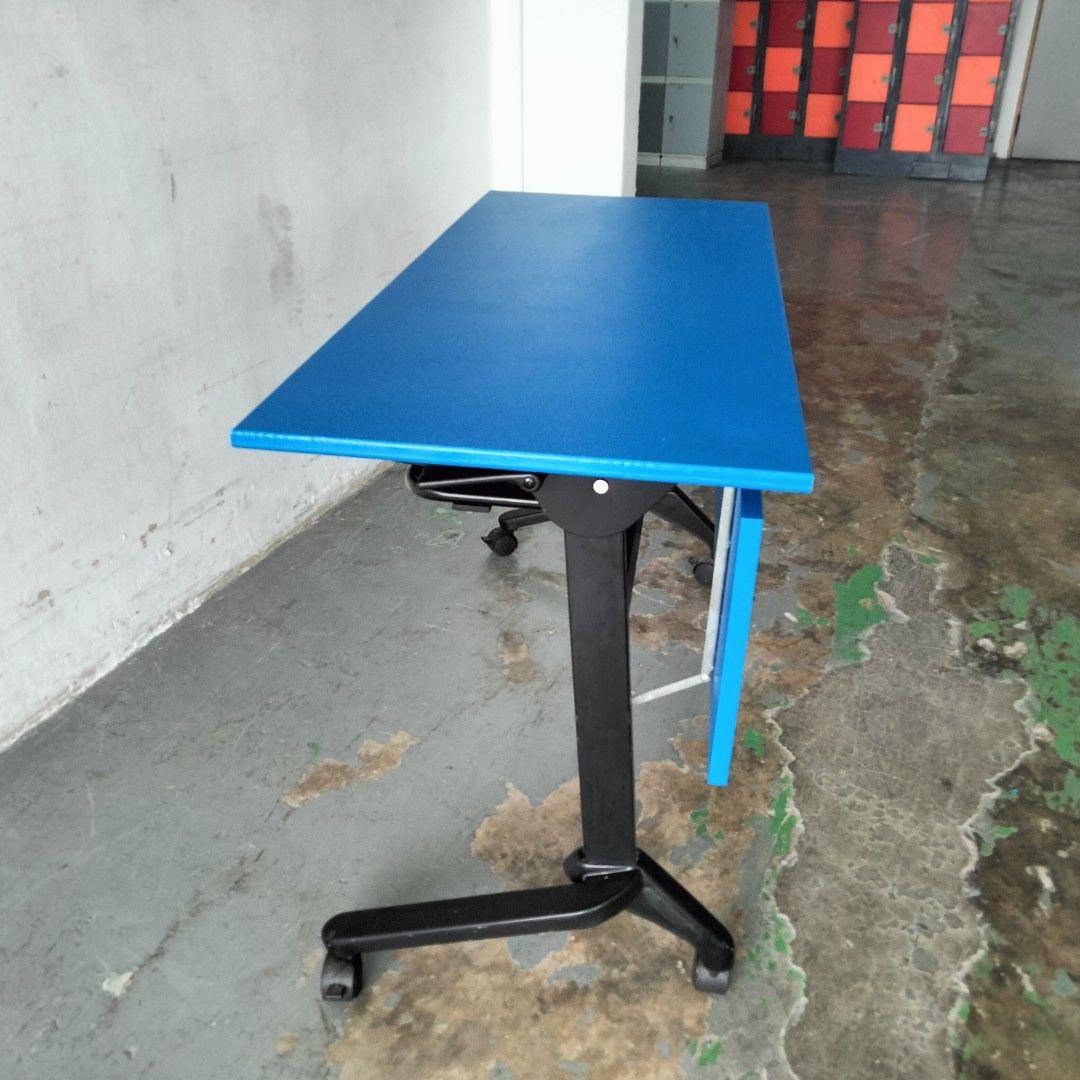 Foldable Study Table (Category: Tables & Sets) located in Singapore. Submitted by kaichispacemaster (Listing ID 1224796422, Image 2). Description: Selling an old sample table. This table folds up to save space. Being sold in "As-Is" condition. Please note that on its surface, you will notice some scratches. Overall, the table is in fair condition..