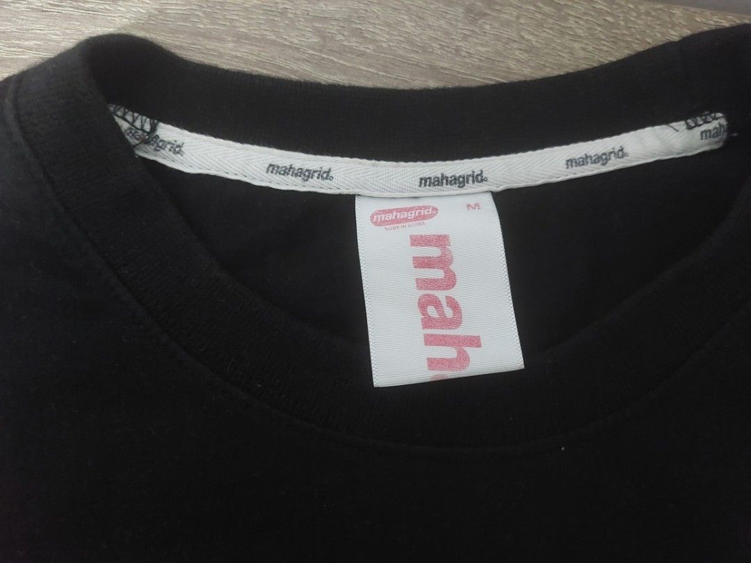 MAHAGRID BLACK LOGO SHIRT (Category: Tshirts & Polo Shirts ) located in Manila. Submitted by jeffangelo97 (Listing ID 1224846427, Image 3). Description: Mahagrid Black Logo shirt Medium Rarely used no issues. no color fading bought from official store shoulder 53cm chest 56.5cm sleeves 22cm length 71cm.