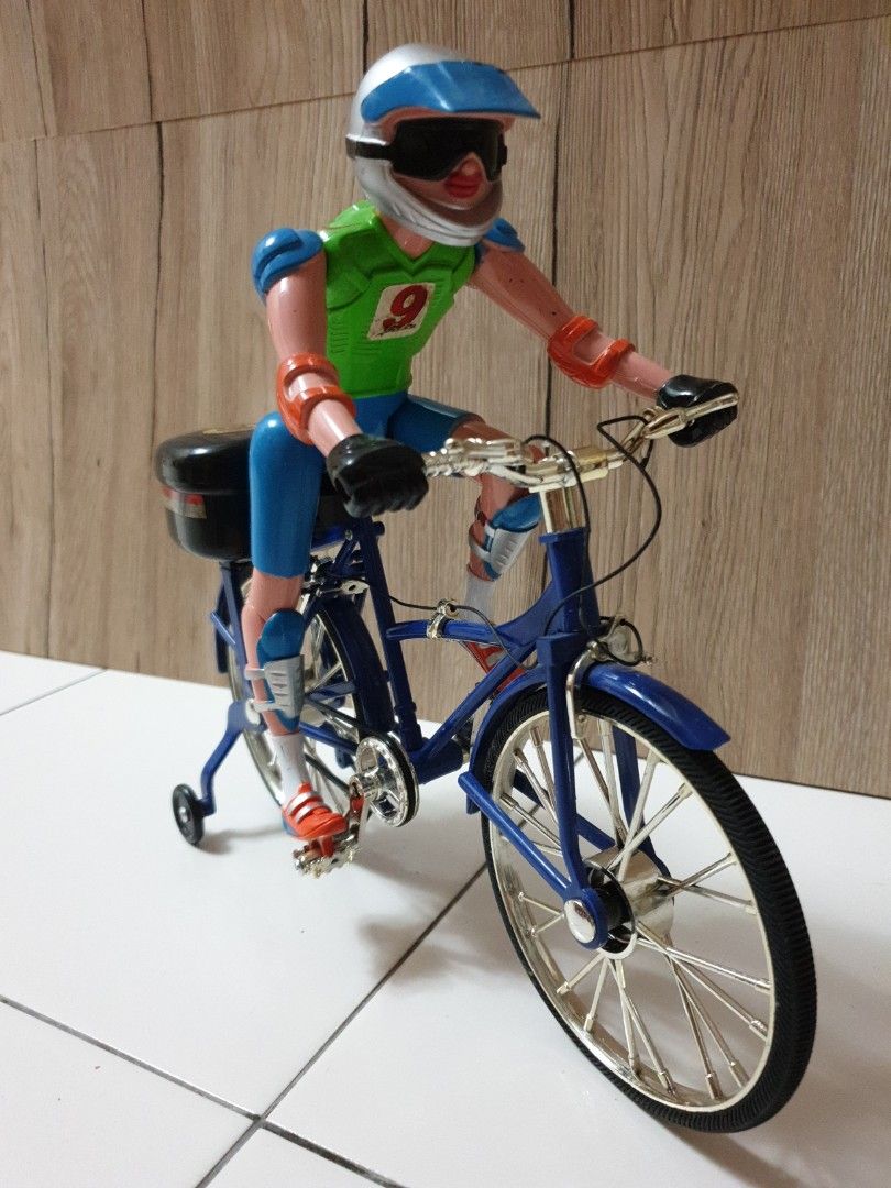 naked man on bicycle