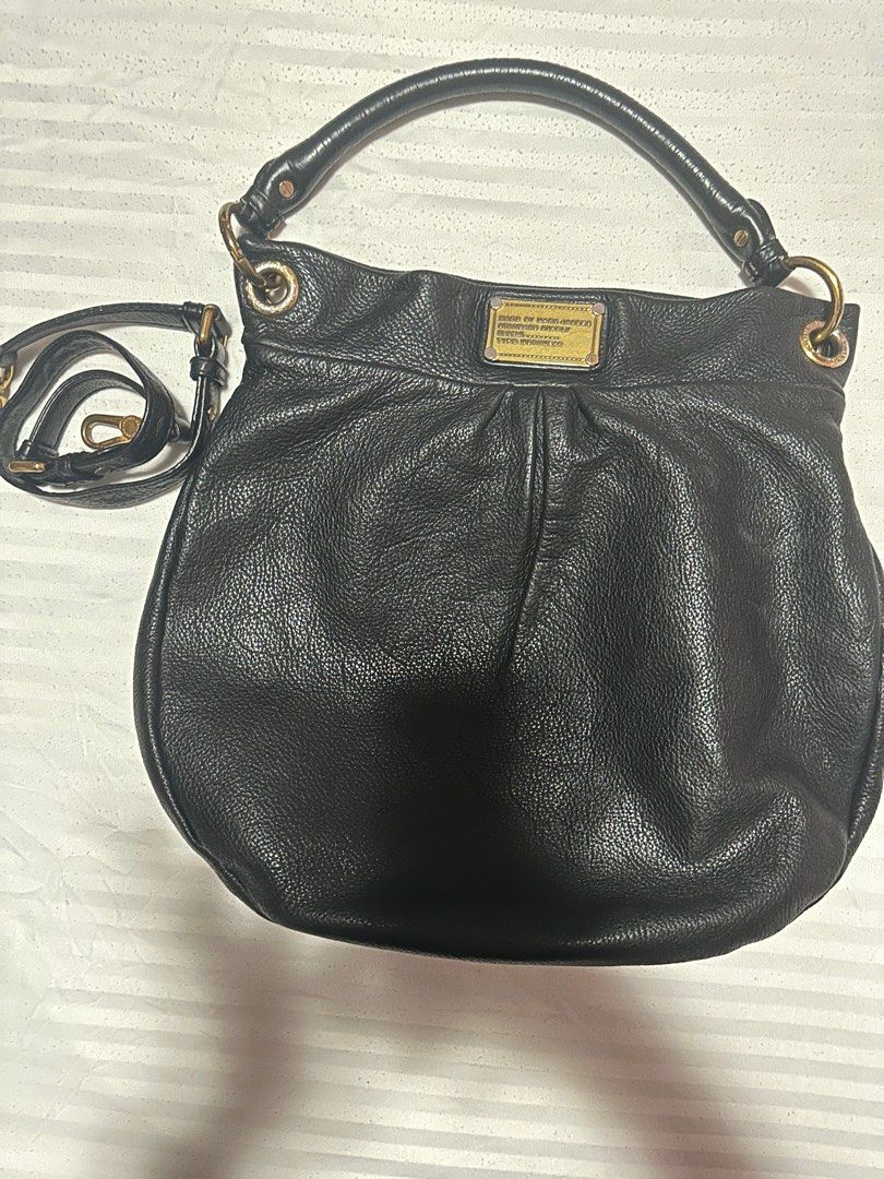 Marc Jacobs Hobo Bag (Category: Luxury Bags & Wallets) located in San Fernando. Submitted by thehamiltonqueen (Listing ID 1224800093, Image 1). Description: Marc Jacobs Hobo Bag Color: Black Hardware: Matte Gold Condition: normal signs of wear but nothing major and some tarnishing on the hardware MOP: BDO,BPI, or GCASH Shipping via JNT ( shipping fee will be shouldered by the buyer).