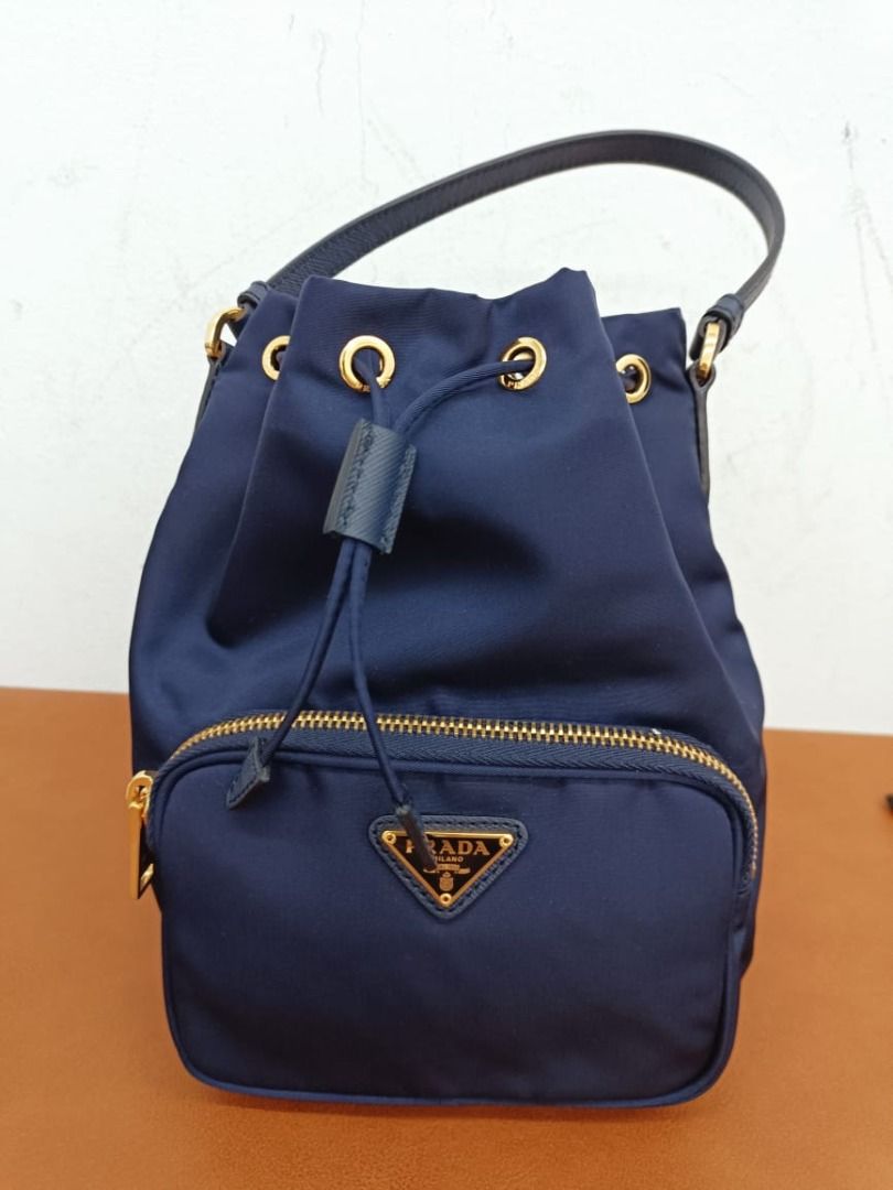 Prada bucket bag blue top