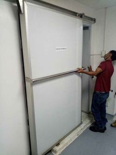 Supply and installation of insulated doors