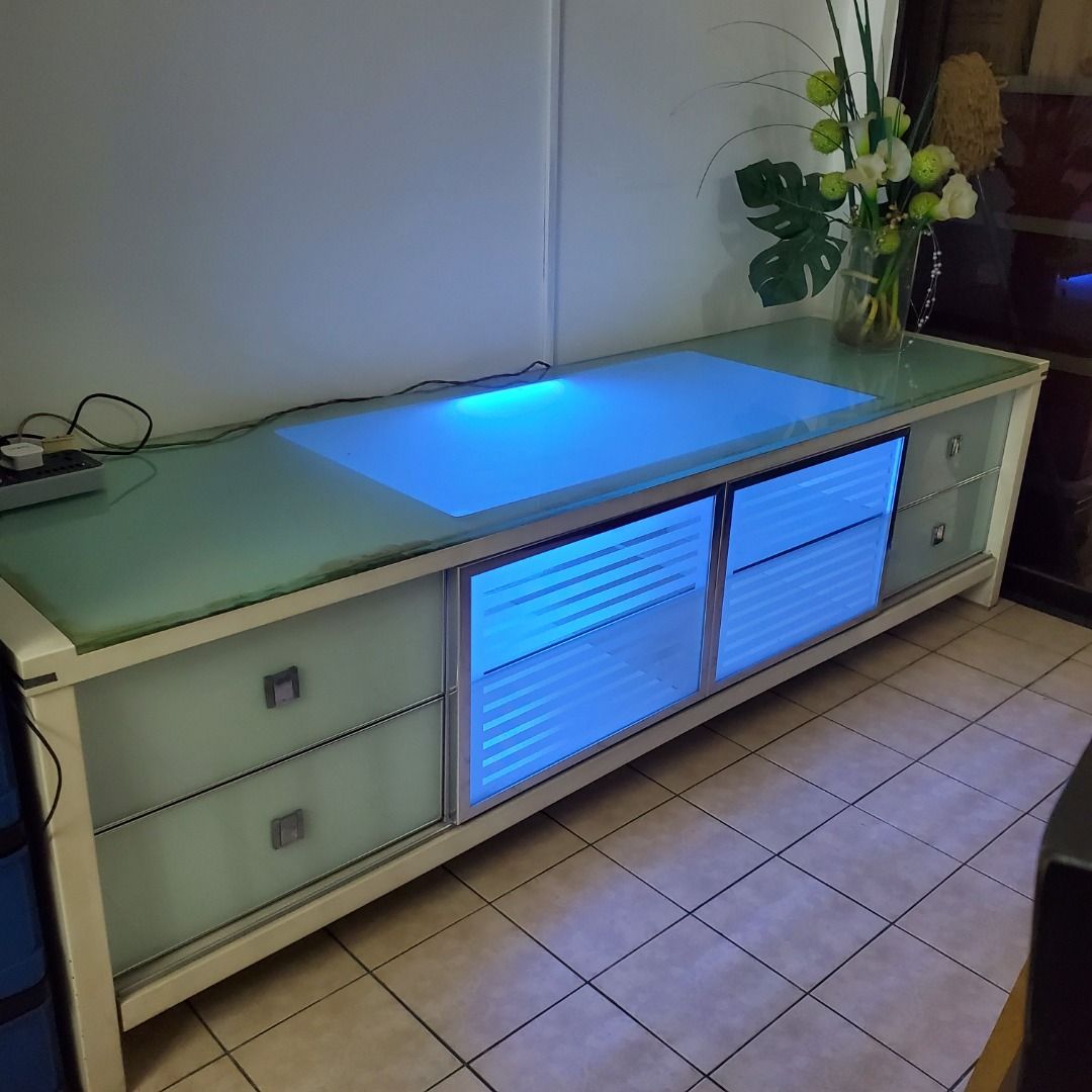 TV Glass top almost 7 feet wide, w 4 drawers, 3 inside compartments, Blue Light