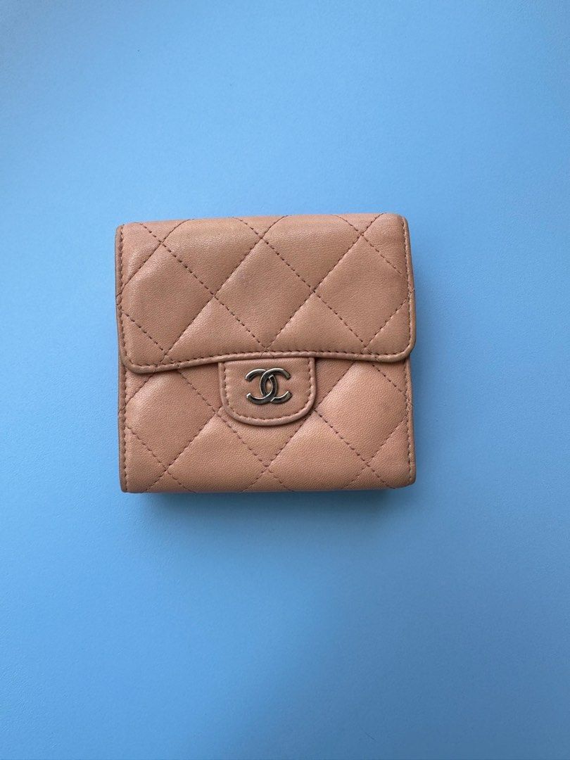 Authentic Chanel Compact Wallet (Category: Luxury Bags & Wallets) located in Pasig City. Submitted by kitsch_closet (Listing ID 1224949139, Image 1). Description: !NO LOWBALLERS! Authentic Chanel Compact Wallet Peach lambskin Rank B Hologram intact Minor signs of usage, minor discoloration.