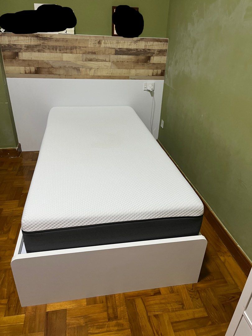Bed frame (Category: Bed Frames & Mattresses) located in Singapore. Submitted by ivefoundit (Listing ID 1225056413, Image 1). Description: Selling my white wooden bed frame. It is a Single. lightly used and loads more life to it! Only selling as i’m renovating my room. This bed frame is made of a sturdy wood and was custom built for my room. It is detachable from the headboard and can be easily installed in a new home :) It has 2 spacious pull ou