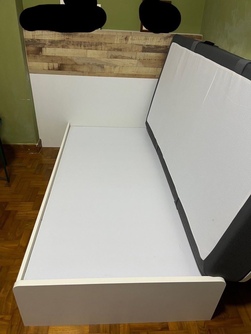 Bed frame (Category: Bed Frames & Mattresses) located in Singapore. Submitted by ivefoundit (Listing ID 1225056413, Image 2). Description: Selling my white wooden bed frame. It is a Single. lightly used and loads more life to it! Only selling as i’m renovating my room. This bed frame is made of a sturdy wood and was custom built for my room. It is detachable from the headboard and can be easily installed in a new home :) It has 2 spacious pull ou