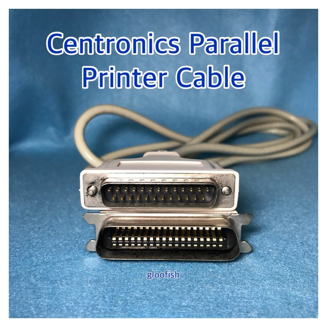 Centronics Parallel Printer Cable (Category: Cables & Adaptors) located in Singapore. Submitted by gloofish (Listing ID 1225019422, Image 2). Description: This is a lightly used DB25 Male to Centronics 36 Male Parallel Printer Cable. It is in good used cosmetic condition showing little wear, the connectors are free from rust and the cord has no cuts or breaks. This cable is ideal for connecting a 25 pin bidirectional printer ports on laptops, com