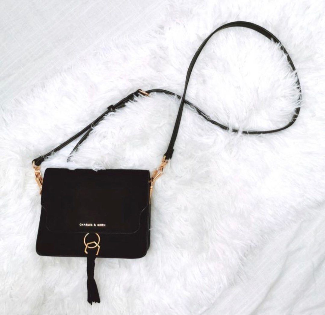 Charles and keith hot sale tassel detail crossbody bag