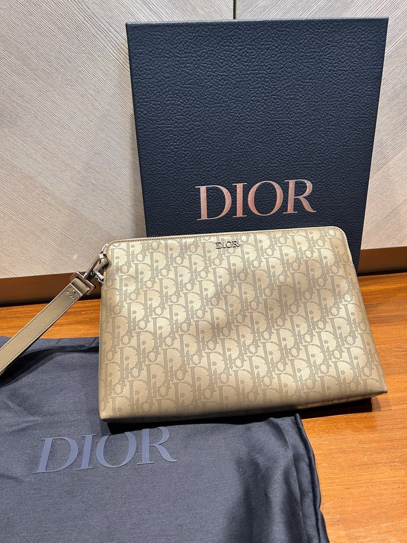 Dior leather clutch, Luxury, Bags & Wallets on Carousell