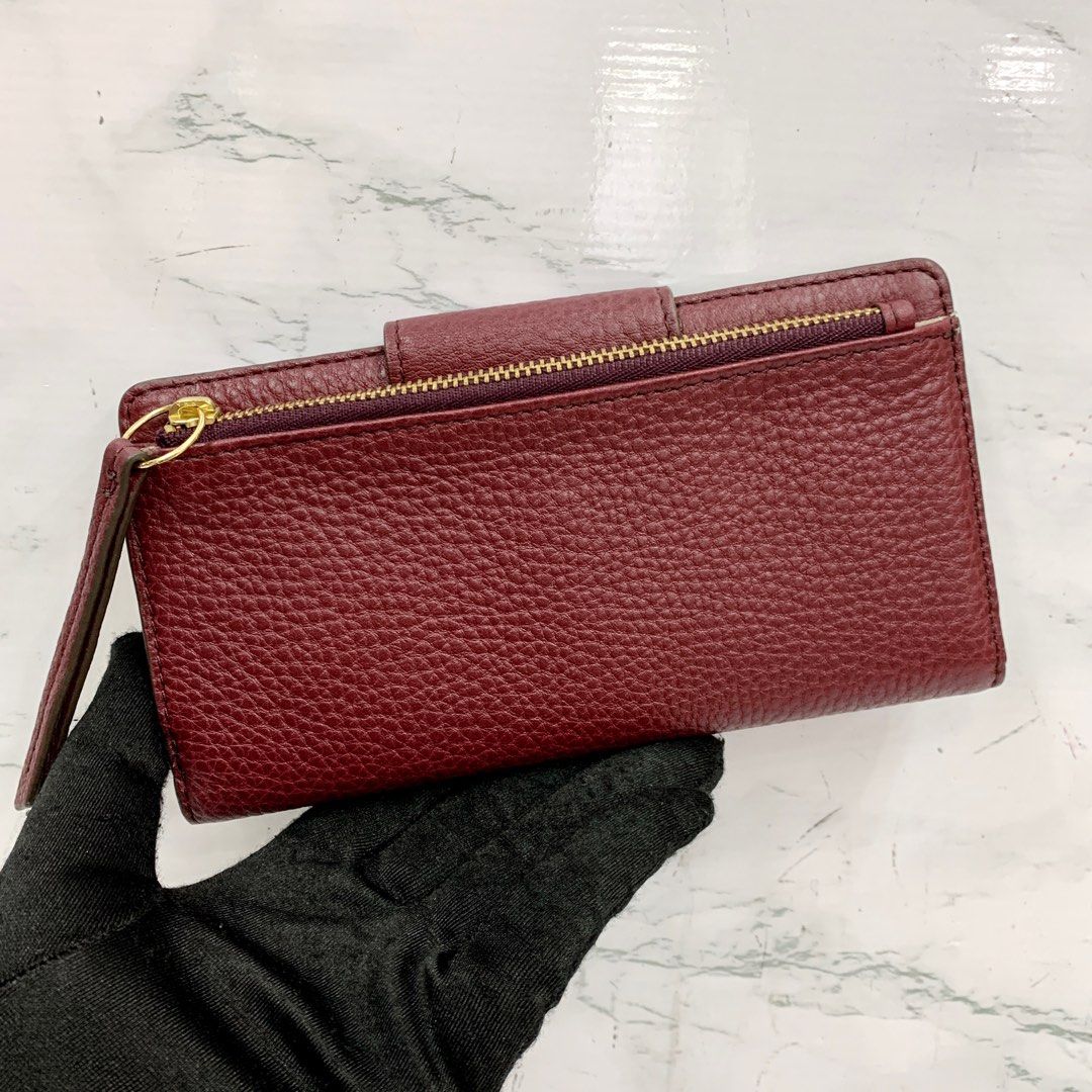 Purple fossil purse on sale